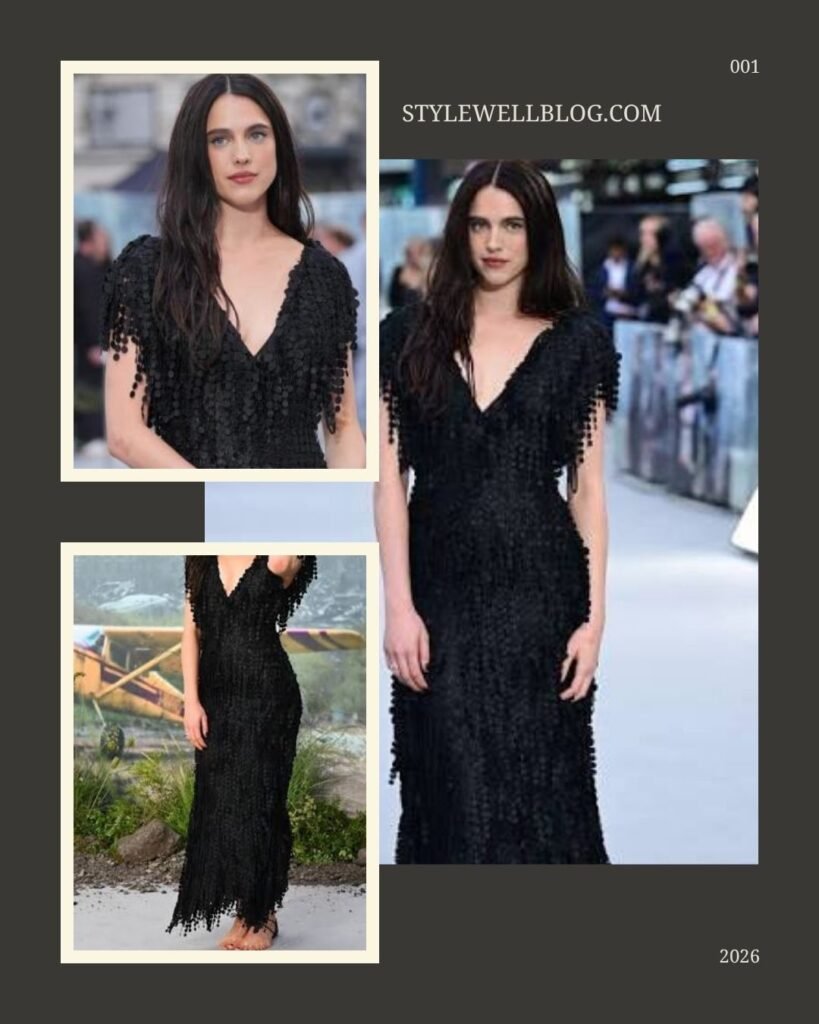 Actress Margaret Qualley showcasing Gothic glamour in a textured, circular-fringed black maxi gown by Chanel during The Dog Stars premiere in London.
