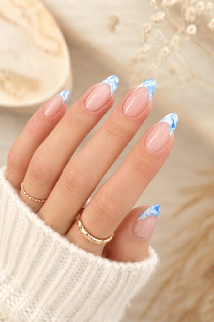 1. Abstract Blue Swirl French Manicure and Ocean Wave French nails