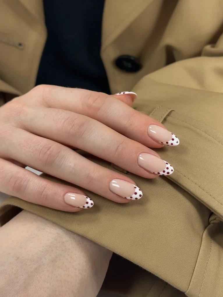 2. Stylish Polka Dot French Tip Manicure